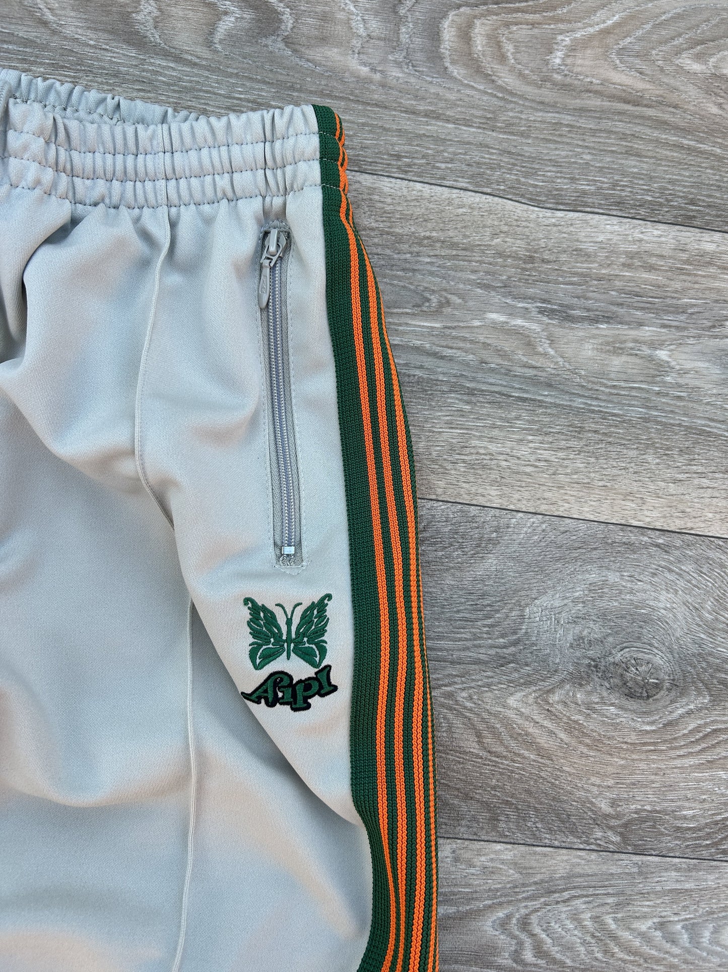 Needles x AIPL logo tracksuit pants