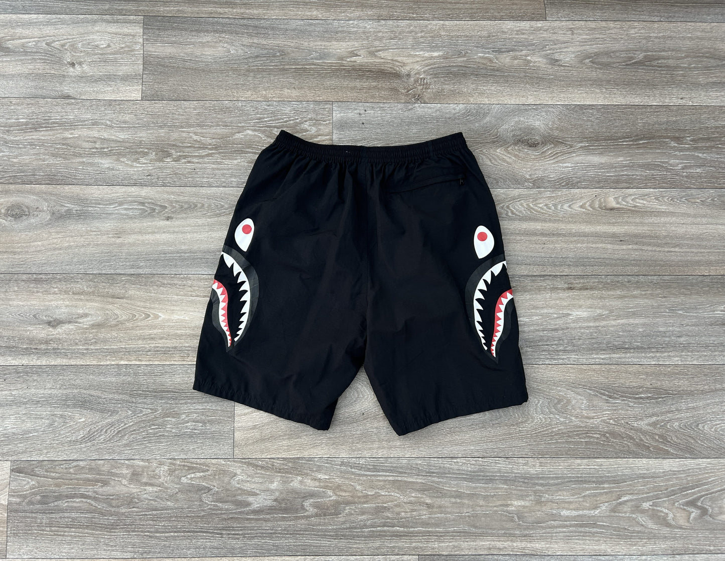 Bape shark logo print shorts