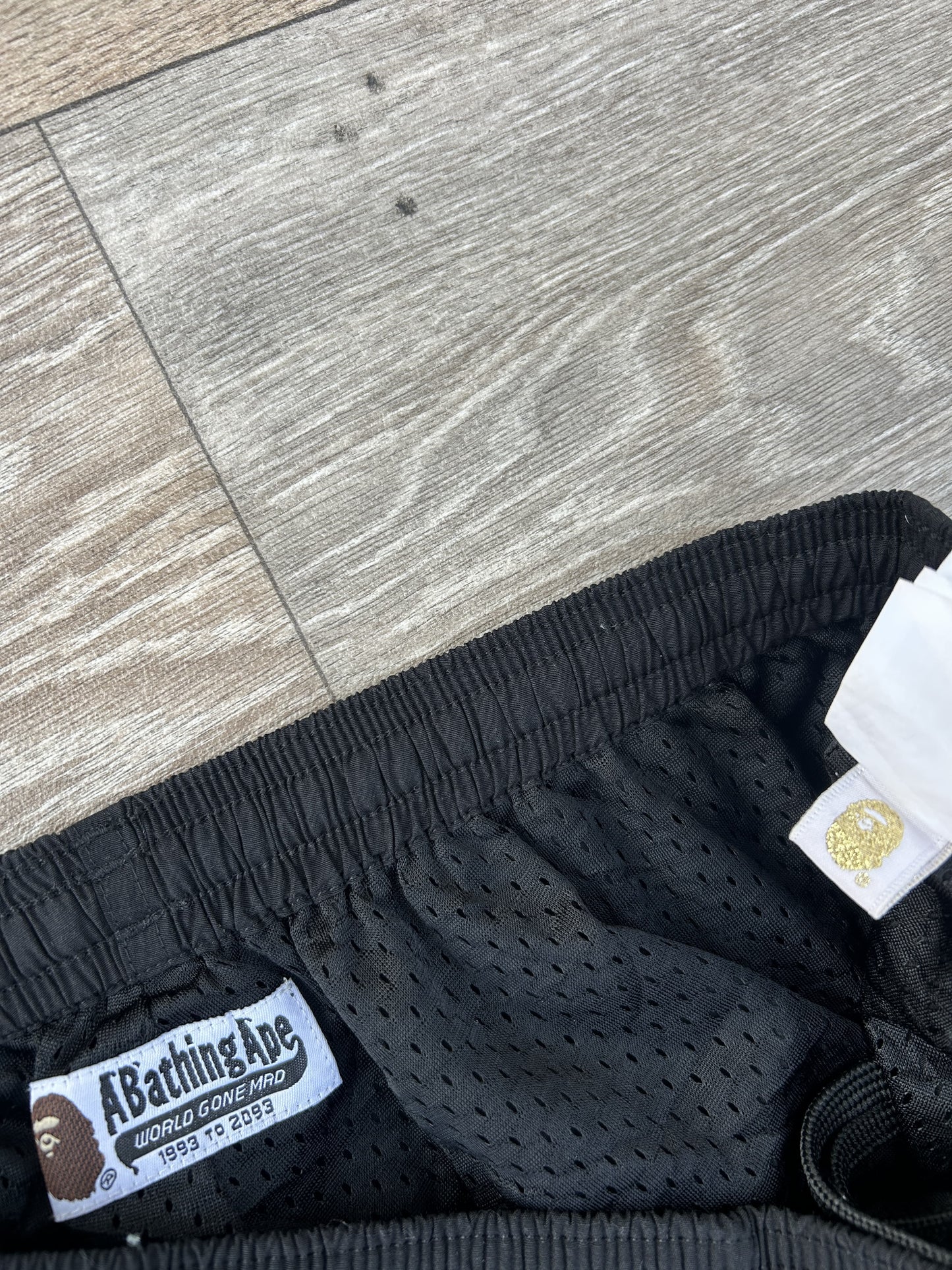 Bape shark logo print shorts