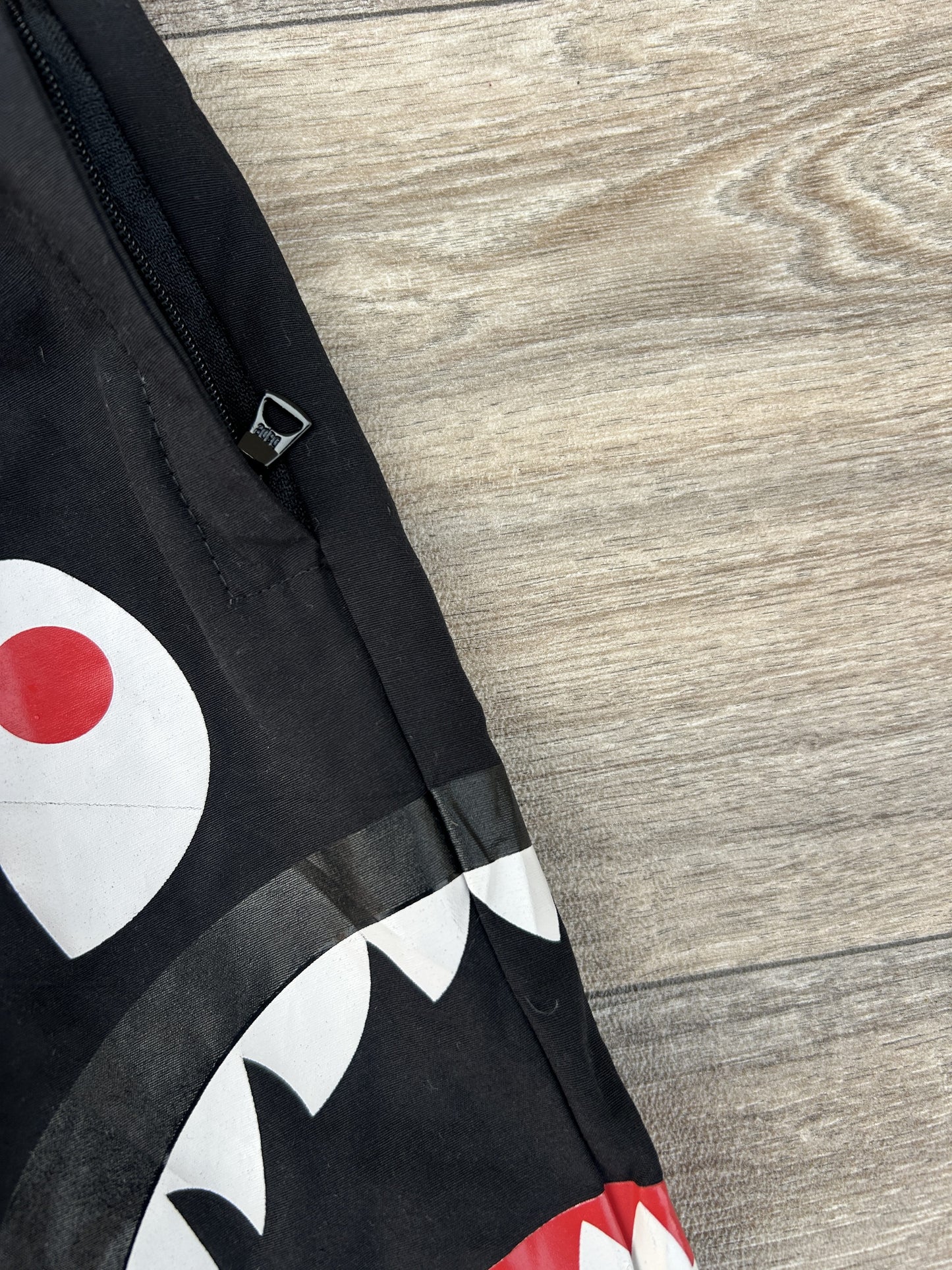Bape shark logo print shorts